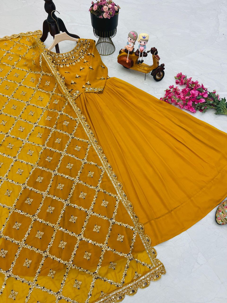 Faux Georgette Sequence Embroidery Work Gown With Yellow Color