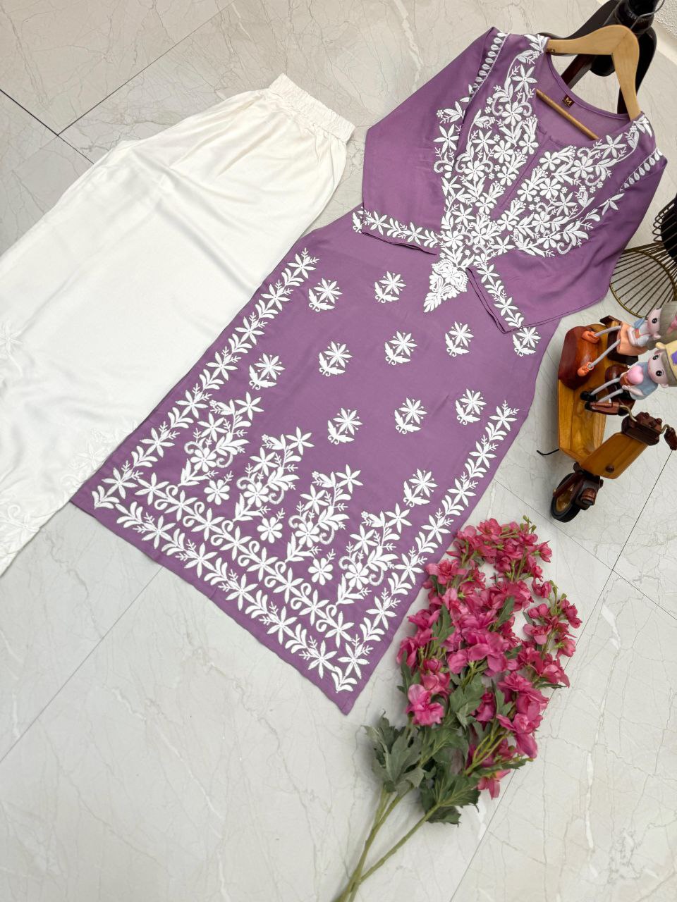 this ­­­­kurti product available in Fancy Rayon Cotton fabric with purple color