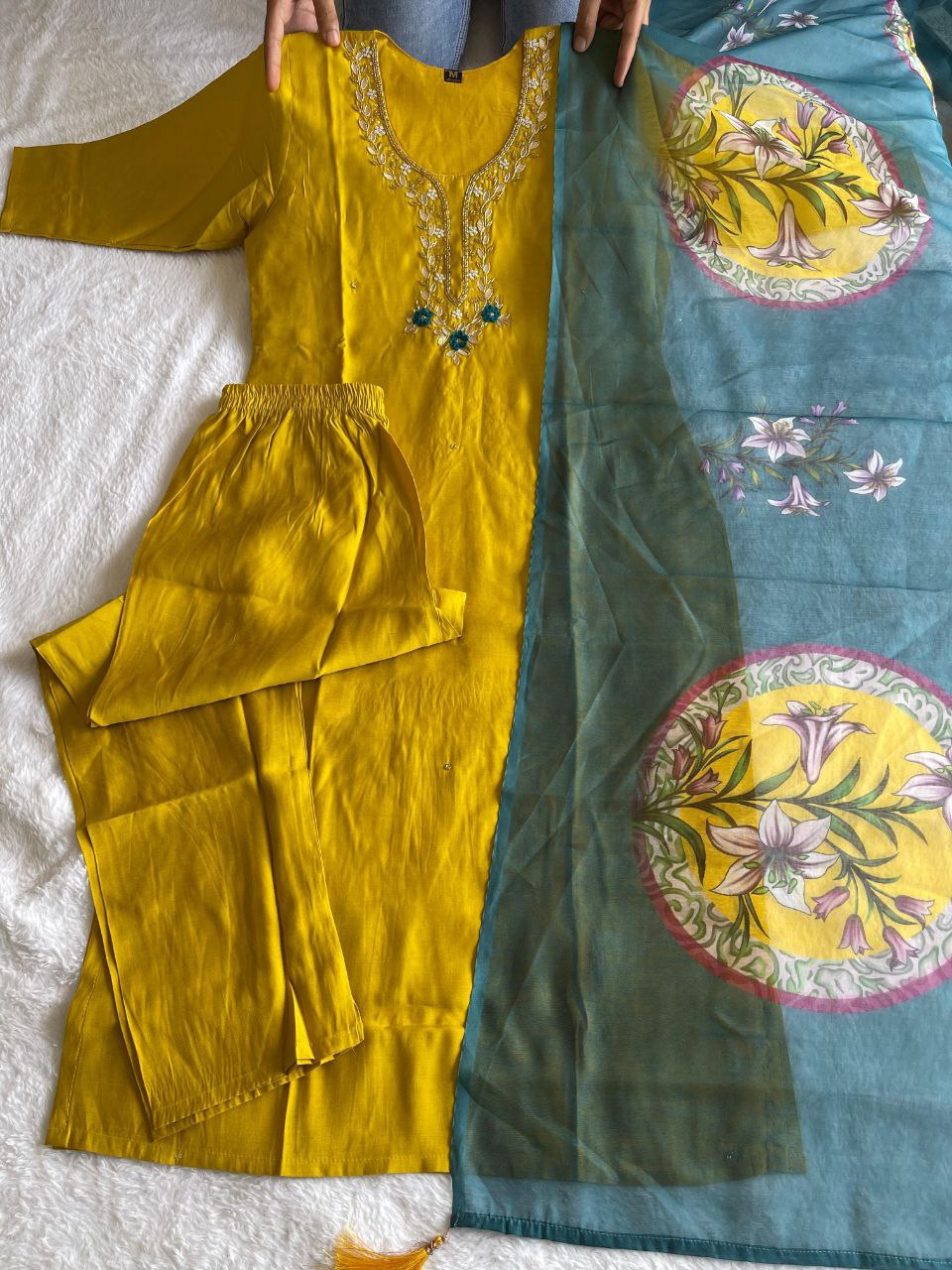 this ­­­­kurti product available in Fancy Premium Roman Silk fabric with yellow color